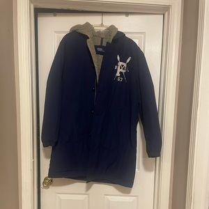 Navy blue Polo jacket/coat 3/4 length. Stain on  left lower sleeve.